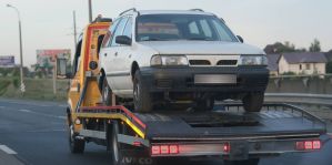 Авто стоит в гараже, находится в неисправном состоянии.  Надо ли уплачивать транспортный налог?