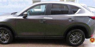 Пьяный гродненец сбросил бутылку на припаркованную во дворе "Мазду". Во сколько эксперты оценили ущерб?